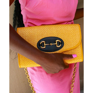 Gucci crossbody bag in yellow raffia with horsebit and chain strap