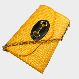 Gucci crossbody bag in yellow raffia with horsebit and chain strap