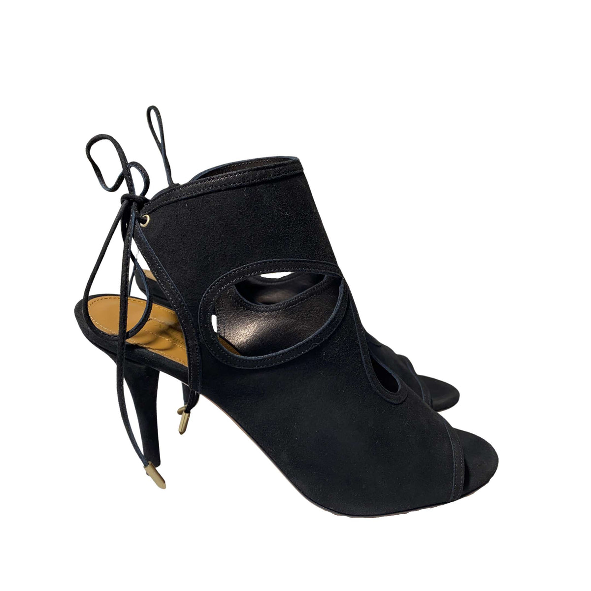 Full side angle of Aquazzura Sexy Thing 85 black suede sandals against a white background, highlighting the 85mm mid-height heel and elegant silhouette.
