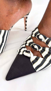 Aquazzura Mondaine striped mule heels featuring black and white knotted bow accents.