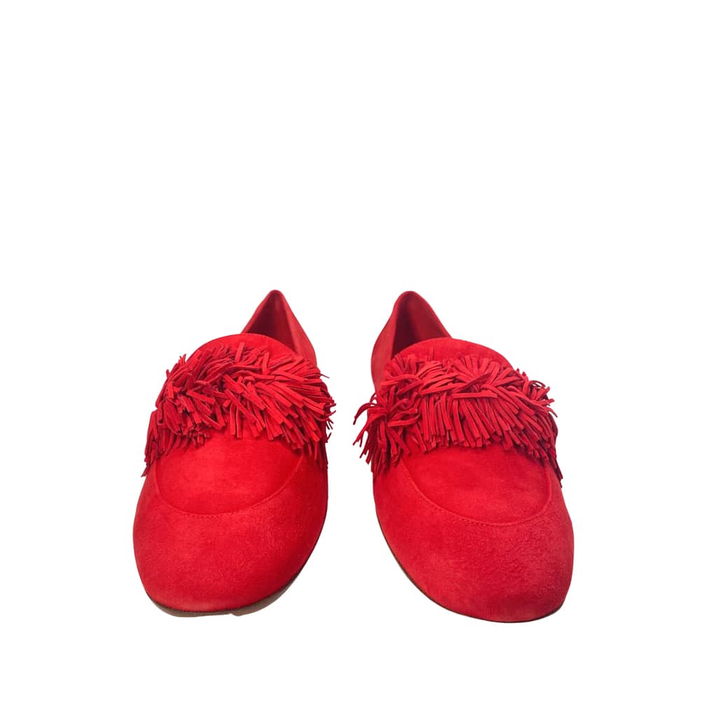 Front angle view of Aquazzura Wild Thing loafers in red suede, showcasing the symmetrical rounded toe and layered fringe detail.