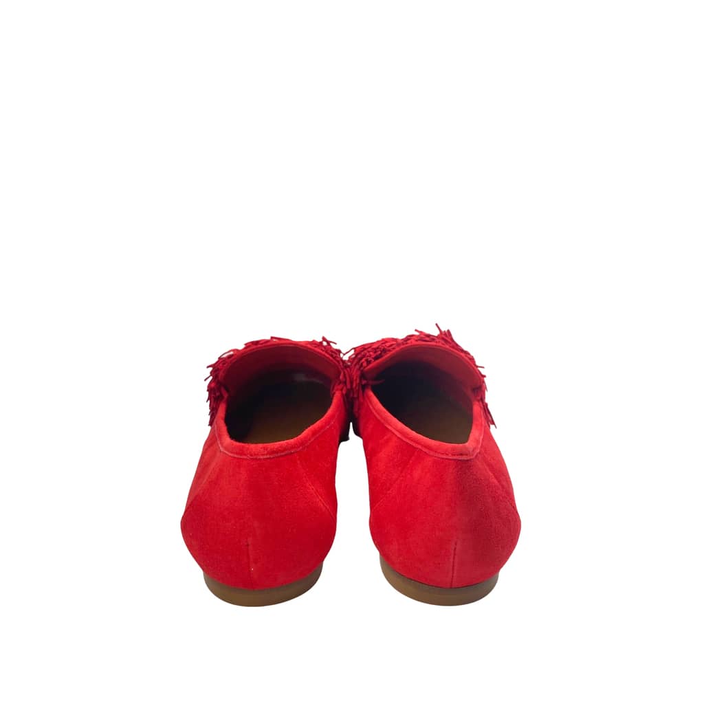 Heel view of Aquazzura Wild Thing red suede loafers from behind, focusing on the clean stitching and minimal low heel profile.