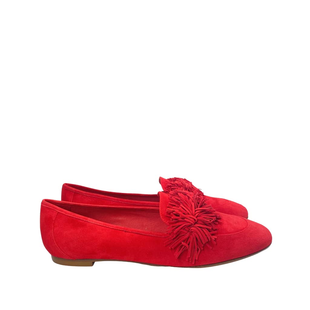 Front angle view of Aquazzura Wild Thing loafers in red suede, showcasing the symmetrical rounded toe and layered fringe detail.