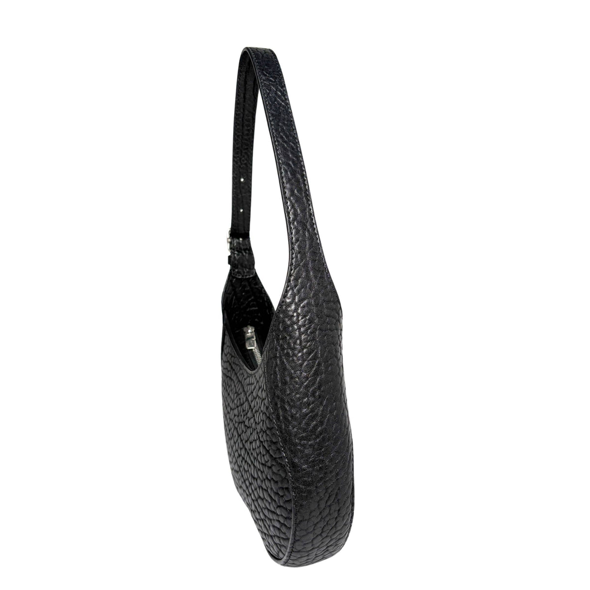 Side profile view of the black leather Burberry Chess bag, demonstrating its slim shape, structured side panel, and integrated shoulder strap.