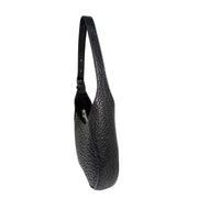 Side profile view of the black leather Burberry Chess bag, demonstrating its slim shape, structured side panel, and integrated shoulder strap.