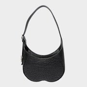 Front view of the luxury Burberry Chess shoulder bag in black textured leather, showcasing its unique curved silhouette and silver-tone hardware