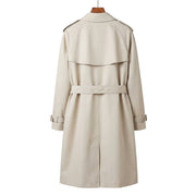 Full-length back view of the tailored Burberry Hillington trench coat in timeless beige, showcasing the clean silhouette and storm flap.