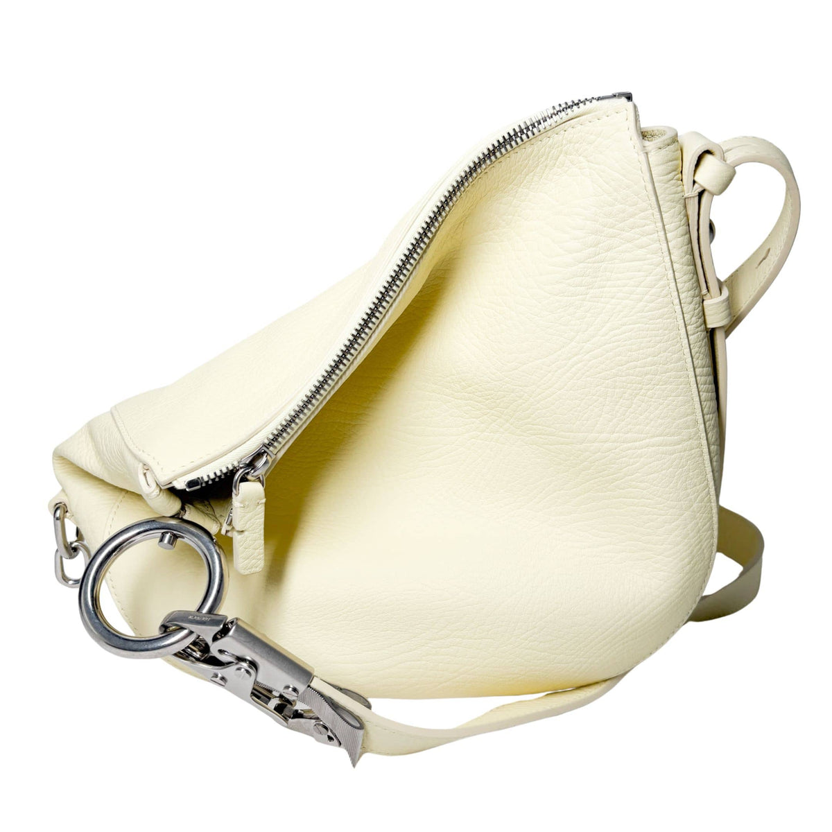 Lime yellow Burberry Knight leather bag folded flat, displaying its asymmetrical structural shape and silver ring attachment.