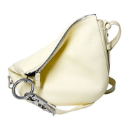 Lime yellow Burberry Knight leather bag folded flat, displaying its asymmetrical structural shape and silver ring attachment.