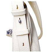 Detailed close-up of the silver-tone zipper closure and textured leather trim on the lime yellow Burberry Knight bag.