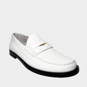 Side profile view of the Burberry Rupert Coin Loafers in premium white leather, showcasing the classic slip-on silhouette and clean black sole contrast.
