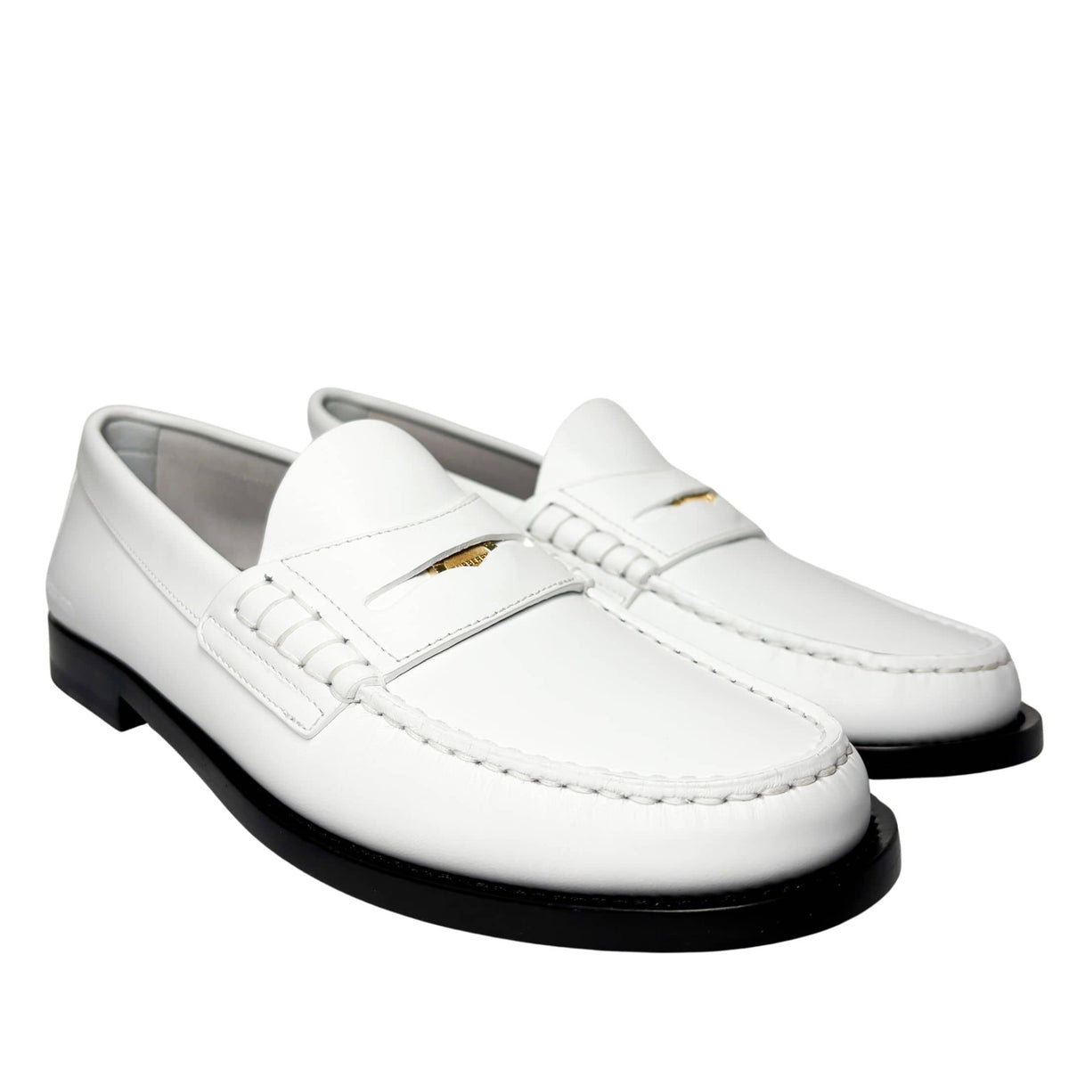 Front-facing studio shot of a pair of white leather Burberry Rupert Coin Loafers, emphasizing the classic round toe design.