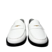 Three-quarter studio profile of the white Burberry Rupert Coin Loafers, showing the elegant lines and polished leather finish.
