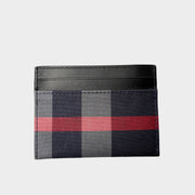 Direct front view of Burberry card holder featuring black leather trim and the iconic House Check patterned canvas.