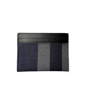 Back view of Burberry House Check leather card holder displaying clean stitching, multiple card slots, and navy and black check pattern.