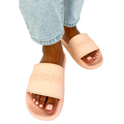 Burberry pool slides in light pink colour made from rubber