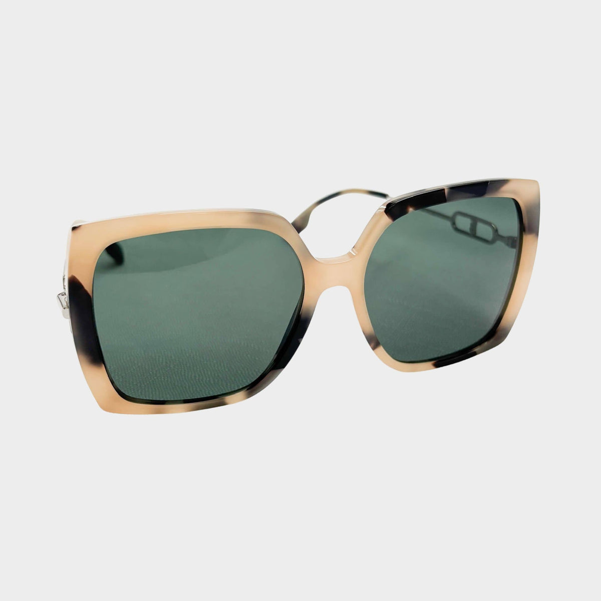 Front view of luxury Burberry square frame sunglasses featuring a bold tortoiseshell acetate frame and dark tint lenses.
