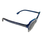 Three-quarter angled profile view of Burberry blue glitter sunglasses showing the thick temple arm design and frame texture.