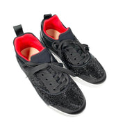 Top-down studio shot of a pair of Christian Louboutin Aurelien black strass sneakers, revealing the bright red padded interior lining.