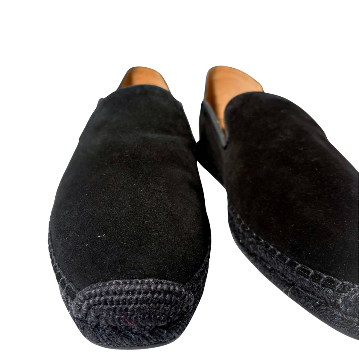 Close-up view of the underside of the Christian Louboutin Varsi Espadon espadrille, showcasing the iconic signature red rubber outsole.