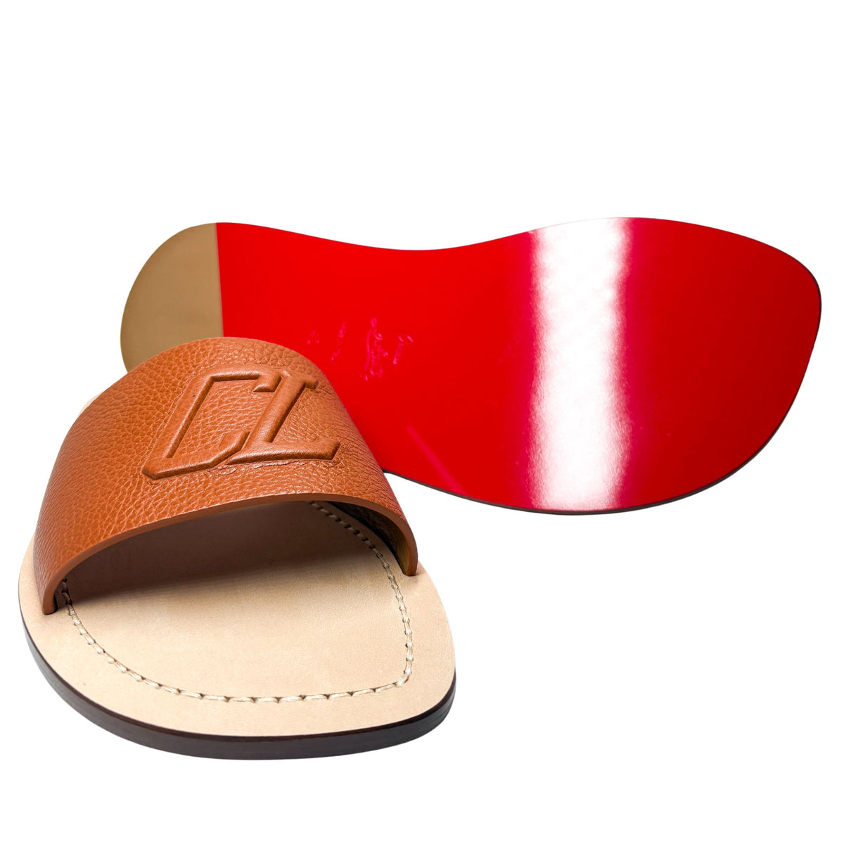 Rear angle view of the Christian Louboutin Varsicool sandals, highlighting the debossed size markings on the signature red sole.