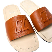 Overhead angled shot of a pair of Christian Louboutin Varsicool brown slides overlapping, highlighting the debossed designer branding.