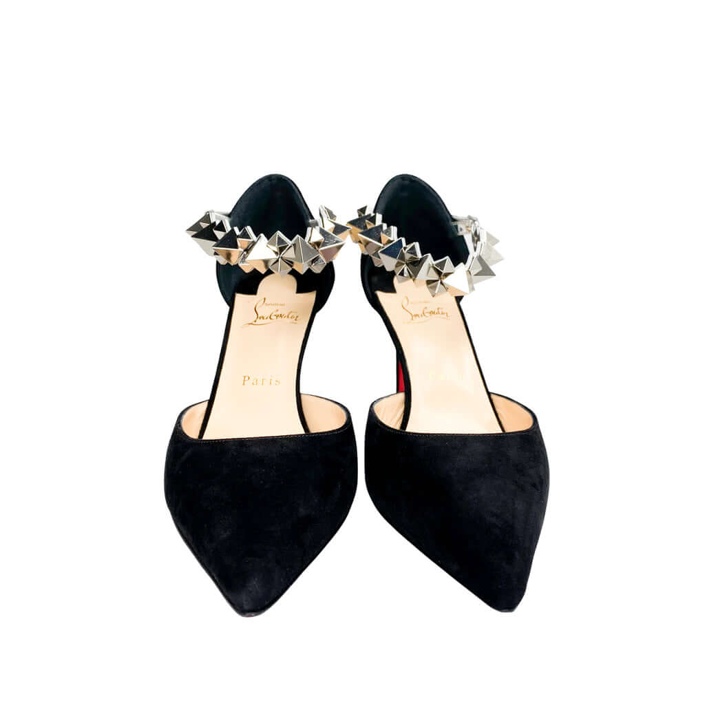 Symmetrical front angle view of the Christian Louboutin Planet Chic 90 heels, focusing on the sharp pointed toe and elegant ankle strap silhouette.