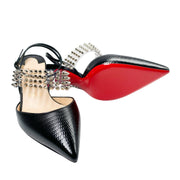 Studio shot of a pair of Christian Louboutin Levita 55 black leather and PVC heels positioned together, showcasing the signature red bottom soles.