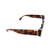 Side profile view of Fendi First tortoiseshell sunglasses showcasing the gold-toned F logo hinge hardware.