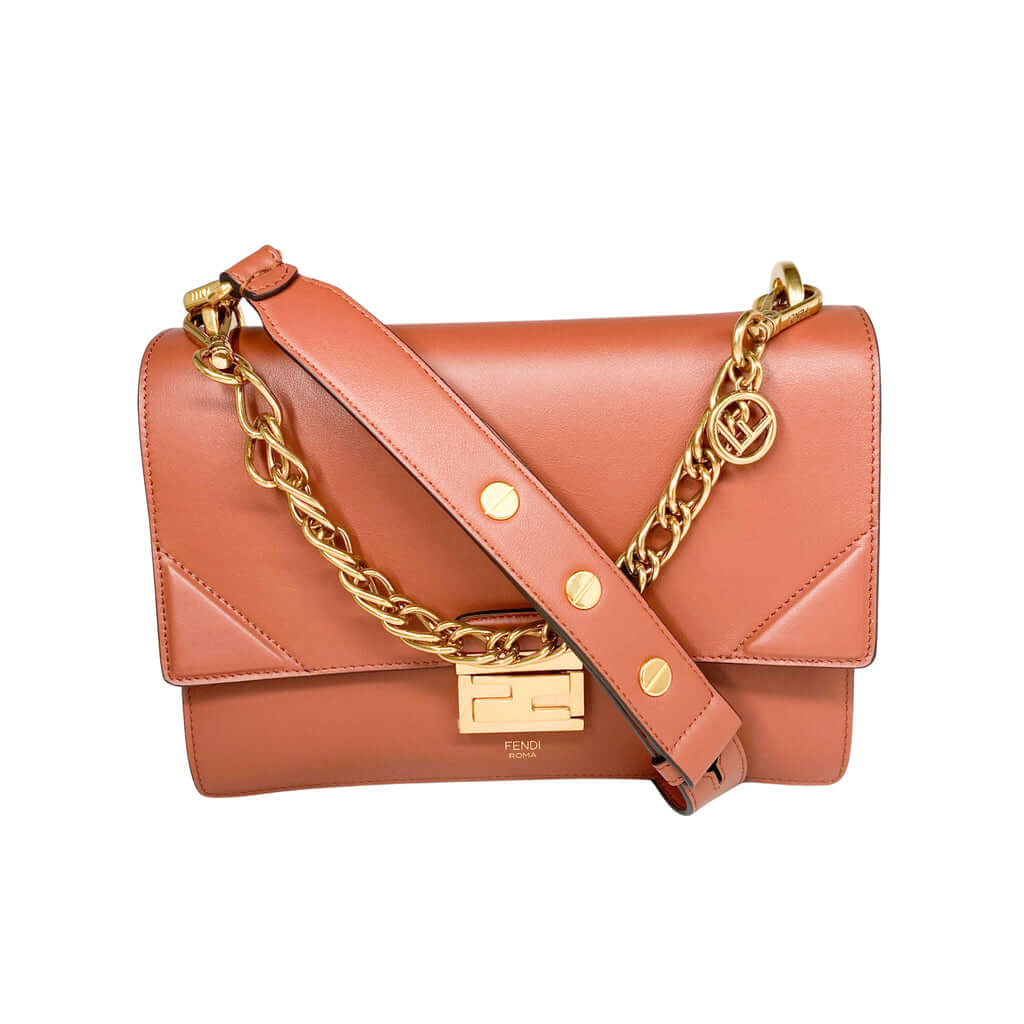 Studio front view of the structured Fendi Kan U brown leather handbag, displaying the clean lines of its envelope silhouette.