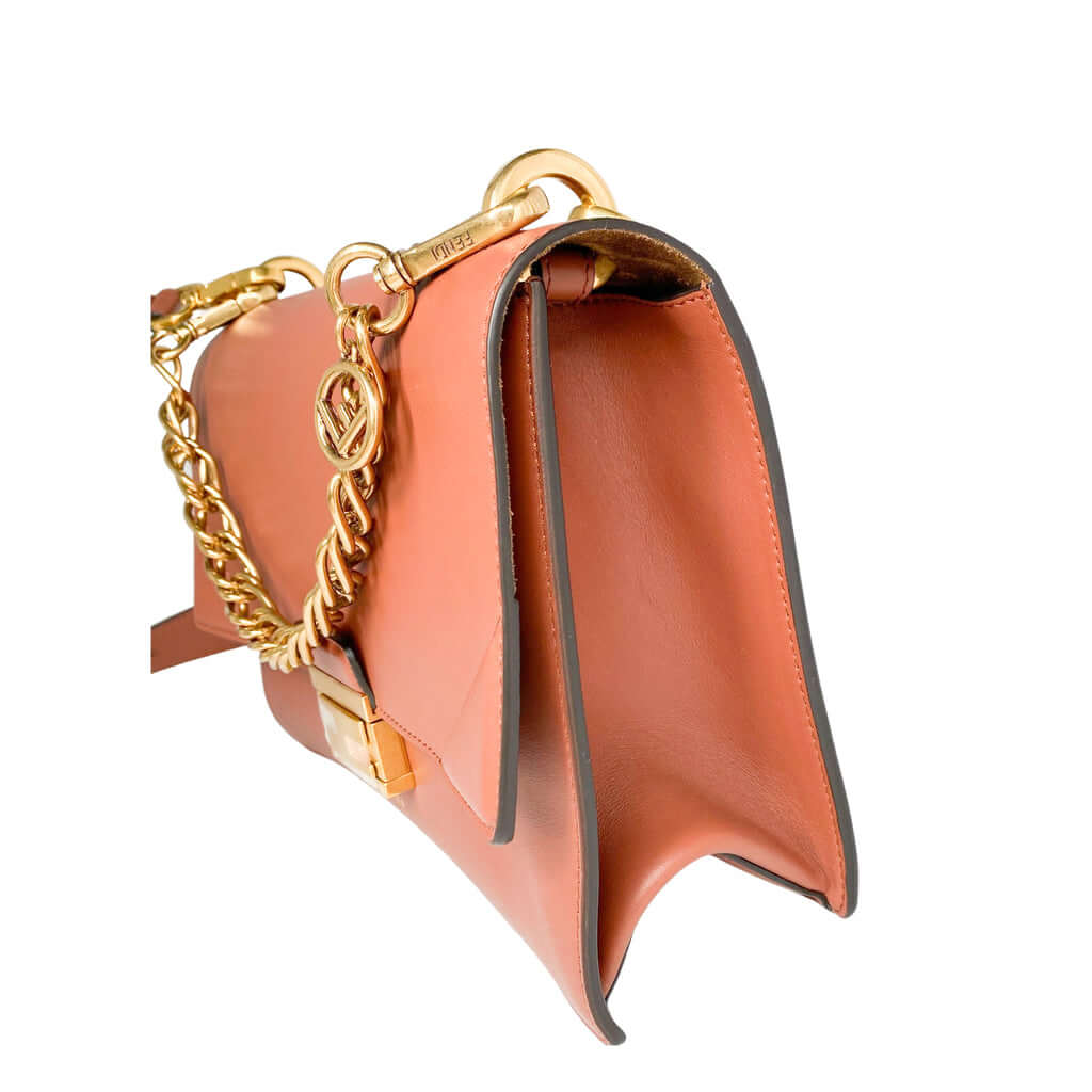 Side angle view of the brown Fendi Kan U shoulder bag, showcasing its expandable gusset layout and premium leather texture.