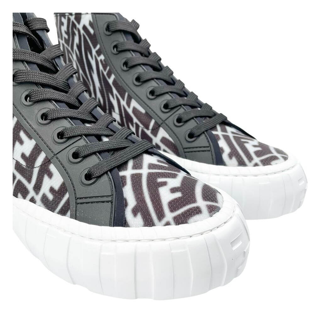 Angled profile view of Fendi FF Vertigo high-top sneakers showcasing chunky white rubber midsole.