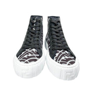 Front view of a pair of Fendi FF Vertigo high-top sneakers displaying black laces and round white toe caps.