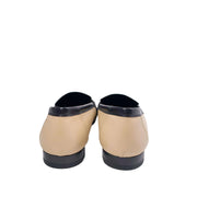 A parallel top-down glance looking directly into the open heel entries of the shoes, highlighting the premium leather inner lining and the refined casual styling.