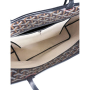 Interior view of Goyard Artois MM tote bag displaying spacious canvas lining and zip pocket.