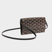 Goyard Varenne Continental Wallet in black Goyardine canvas styled with detachable leather crossbody shoulder strap.
