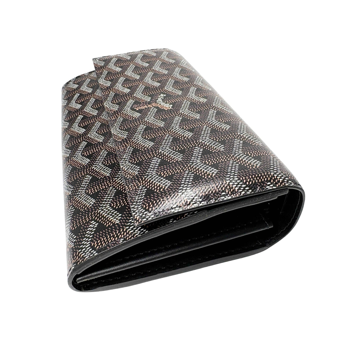 Three-quarter view of Goyard Varenne Continental Wallet highlighting its sleek flap closure and compact long-wallet silhouette.