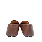 Back view of Gucci brown leather Horsebit loafers showing rounded heel counters and outsole wrap.