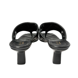 Gucci Charlotte Thong Sandals black leather with brushed gold GG logo, comfortable low heel
