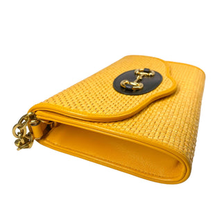 Gucci crossbody bag in yellow raffia with horsebit and chain strap