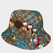Front view of Gucci x Disney Donald Duck bucket hat in brown GG Supreme monogram canvas with colorful character print
