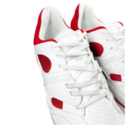 Close-up view of white lacing and SEGA-inspired Gucci graphic logo patch on Flashtrek sneaker tongue.