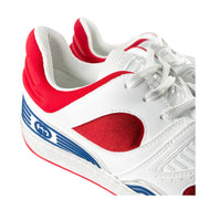 Close-up view of red synthetic side overlays and breathable mesh paneling on Gucci Flashtrek shoes.