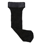Flat lay view of the black Gucci GG monogram net stockings showcasing the overall silhouette and structured toe construction.
