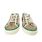 Front view of a pair of Gucci x Disney Mickey Mouse 1977 canvas sneakers with white laces.