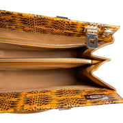 Close-up of Gucci Python Top Handle Bag showcasing the natural python texture and signature Gucci design details