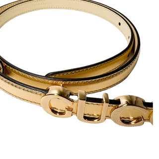 Authentic Gucci Plutone Belt in metallic gold leather, showcasing refined craftsmanship and elegant detailing