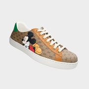 Gucci x Mickey Mouse Ace Men's Sneaker in GG Supreme canvas featuring printed Disney Mickey Mouse motif.