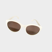 Angled side profile of white Gucci sunglasses highlighting the gold-toned GG logo hardware on the temple