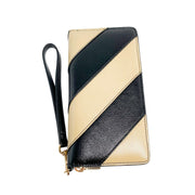 Back view of Gucci Zumi diagonal stripe leather wristlet wallet featuring clean black and beige striped construction